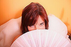 White stockings and folding fan